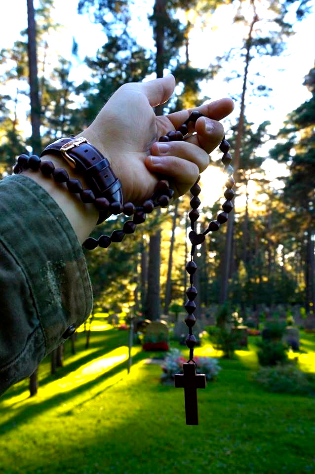 holding my brothers rosary towards the light in this peaceful place. i will never forget you broski. love and miss you more than i could ever put into words.