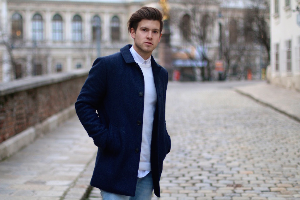 Menswear Blogger wearing navy winter coat by Selected Homme in Vienna