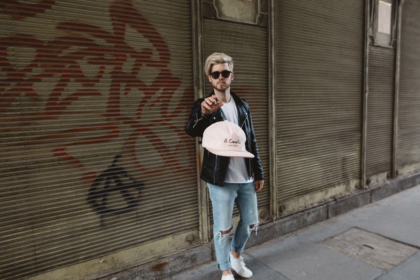 meanwhile in awesometown austrian mens fashion and lifestyle blogger leather biker jacket neuw ripped jeans barney cools hat